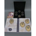 1936 Year of the Three Kings cased collection comprising four oval medallion gold plated coins