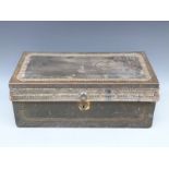 A 19thC camphor wood and brass studded leather trunk with drop handles,
