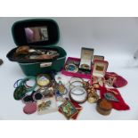 A collection of costume jewellery including brooches, bangles, pendants,