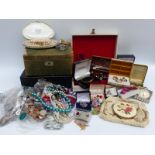 A large collection of jewellery to include amethyst necklace, beads, Stratton compact,