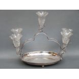 A cut glass and silver plated epergne with tray below, mounted with five cut glass trumpets,