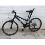 Child's black mountain bike with front suspension