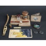A collection of items including Mouseman style cheese board, Felea watch,