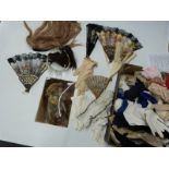 A large collection of vintage handbags, gloves,