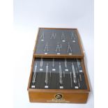 Counter-top shop display of Jakar Drawing Instruments with drawer to base