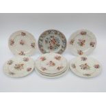 A collection of 19thC hand decorated relief moulded dessert plates and teaware marked 'New Scala