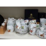 A large collection of Royal Worcester Evesham dinner, tea and oven ware including two spice racks,