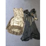 A 1920s / 1930s gold lame dress together with a black bead work dress with label Reville & Rossiter