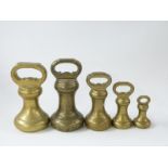 Run of brass or bronze bell weights 4lb to 8oz together with a Parnall Bristol 4lb bell weight