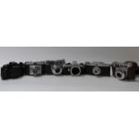 A quantity of collectable cameras including Praktica BC1 SLR, Pentax ME Super,