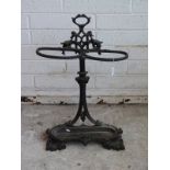 A cast iron stick/umbrella stand