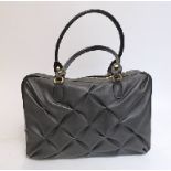 Smythson of Bond Street black leather handbag with quilted effect to the sides and iPad pocket