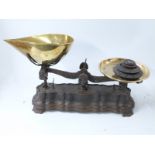 19thC cast iron shop or similar scales with decorative shaped base,