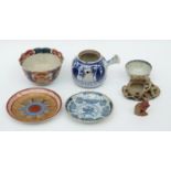 A quantity of Oriental ceramics including tea bowl, teapot, saucers,