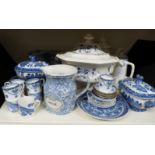 A collection of blue and white ceramics to include tureens, tea, coffee and sugar jars,