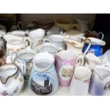 A collection of milk and cream jugs including Spode,