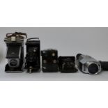 A quantity of collectable cameras including a small Ica Atom folding camera, Yashica camera,