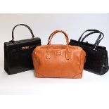 Bric's handbag with warranty and strap,