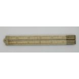 A 19thC/early 20thC ivory four section folding 24 inch ruler