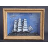 A sailing ship /seascape diorama with three masted schooner and steam tug, framed and glazed,