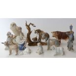 A group of eleven porcelain and resin figures including Nao, a Franklin Mint figural owl clock,
