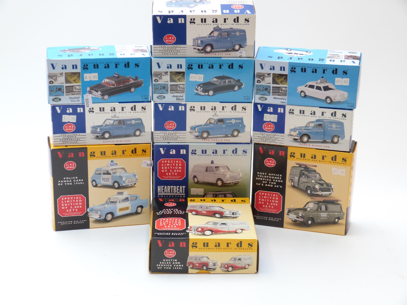 Eleven Vanguards 1:43 scale diecast model vehicles including limited edition police cars,