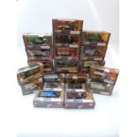 Twenty-three Corgi Classics diecast model commercial vehicles with advertising decals,