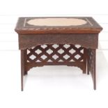 A 19thC Anglo Indian / Sri Lankan scribe's campaign desk with shaped mahogany cartouche and