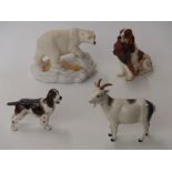 Four Royal Doulton figures including a spaniel with pheasants, polar bear DA155,