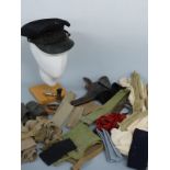 A collection of military items to include three pairs of puttees, seven pairs of socks,