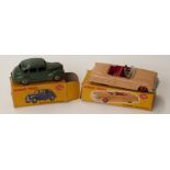 Two Dinky Toys diecast model cars Packard Convertible with brown body and red interior and hubs 132