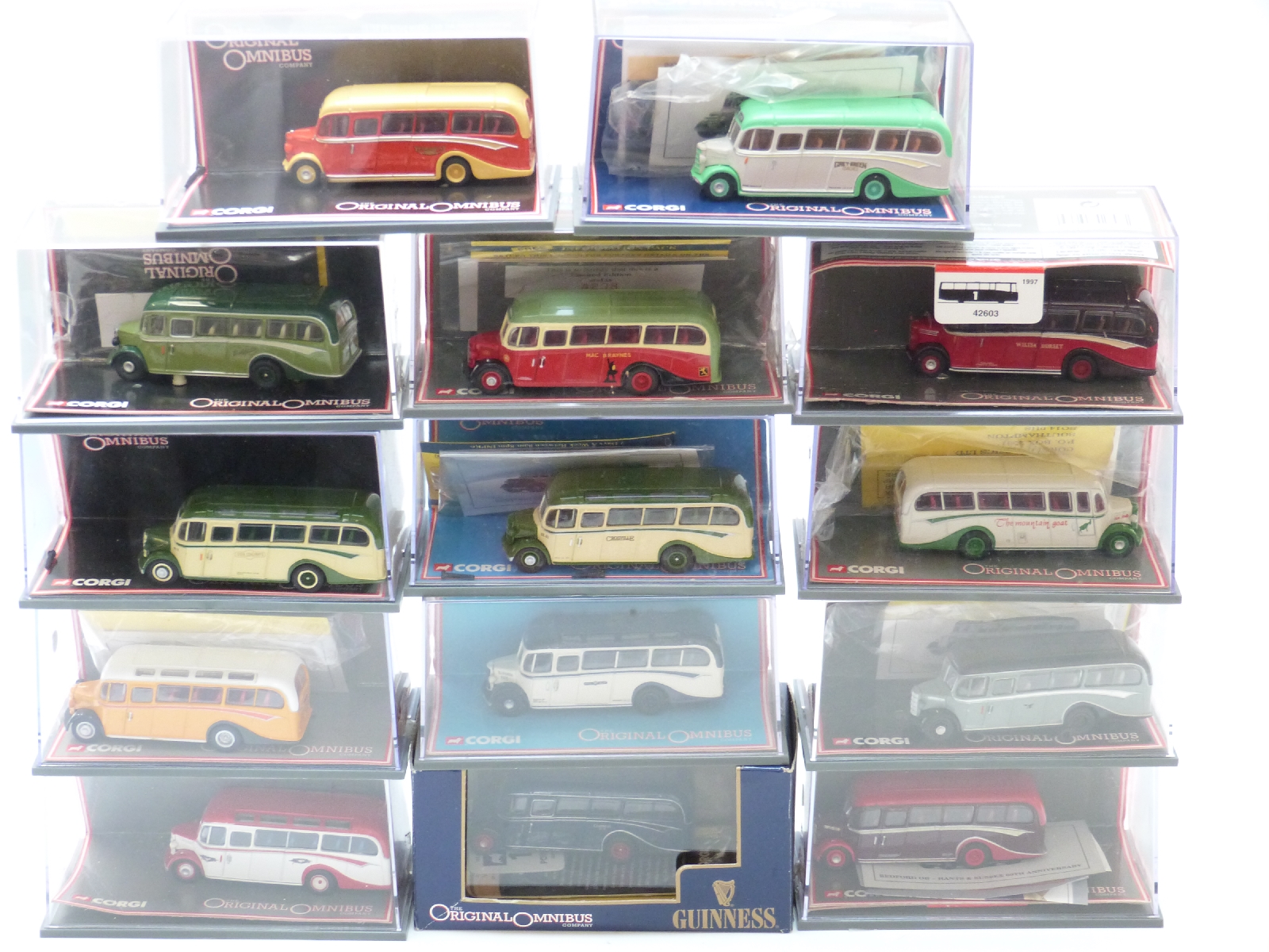 Fourteen Corgi Original Omnibus Company (OOC) diecast model buses including Guinness,