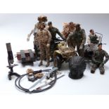 Seven Action Man figures together with various vehicles and accessories, a model of a cannon,