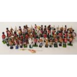 Fifty-seven Britains and similar diecast metal and lead military bandsmen