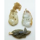 Two Chinese jadeite pendants in the form of peaches and a jadeite pendant in the form of a fish