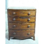 A small Victorian mahogany bow fronted chest of four graduated drawers,