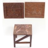 Benin carved table, 33 x 28 x 36cm, and two plaques,