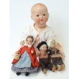 Four dolls comprising two composite dolls one marked 'R Germany 12/0' the other 'British Dollies 5'