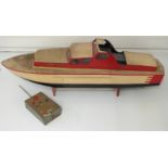 Vintage remote control wooden model boat with Taplin twin cylinder diesel engine and radio handset,