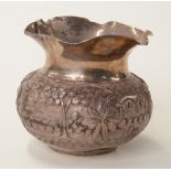 Eastern silver vase with decoration depicting harvesting,