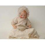 Armand Marseille bisque headed doll with open mouth, weighted blue eyes,