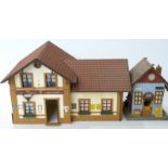 Seven various G scale garden railway buildings