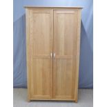 Modern light oak two door wardrobe W110 x D54 x H192cm