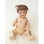 Armand Marseille bisque headed doll with open mouth, weighted brown eyes,