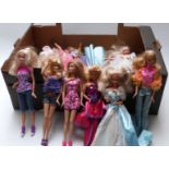 Approximately thirty Barbie dolls of differing ages