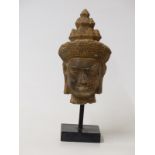 Cambodian stone carving of a Khmer head, possibly late 10thC,