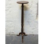 Mahogany torchere / jardiniere stand with rope twist design,