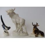 Three Lomonosov USSR figures comprising two moose,