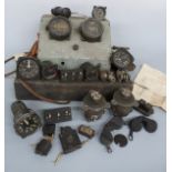 A collection of vintage gauges and switches including Bakelite Air Ministry switch sets,