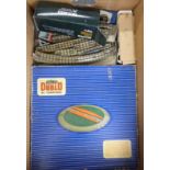 A collection of Hornby Dublo 00 gauge accessories including signals, buffers, points,